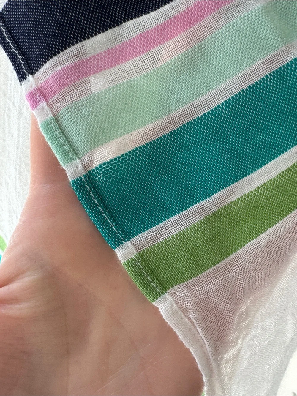 Old Navy white, navy, green and pink tasseled wrap.